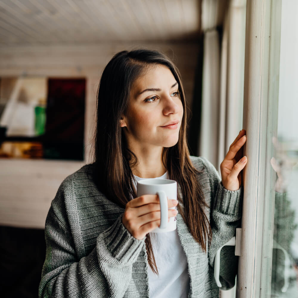Young woman spending free time home